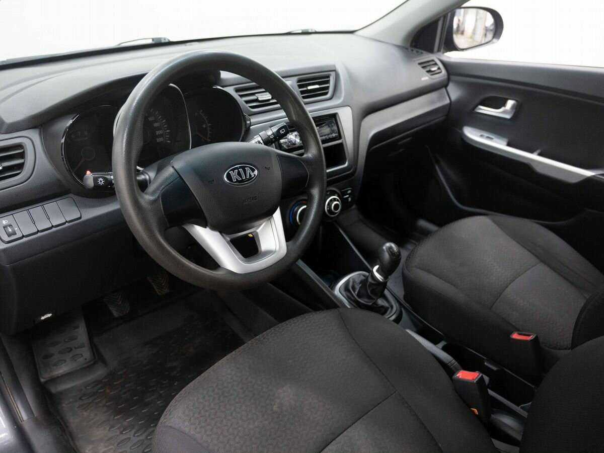 Kia Rio с пробегом — 2013 год. Фото: #6