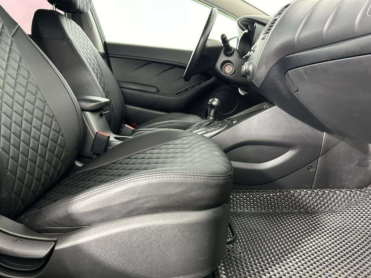 Kia Cerato с пробегом — 2014 год. Фото: #13
