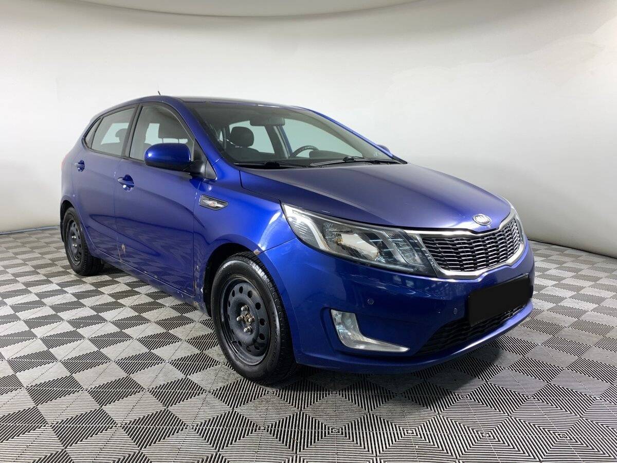 Kia Rio с пробегом — 2013 год. Фото: #2